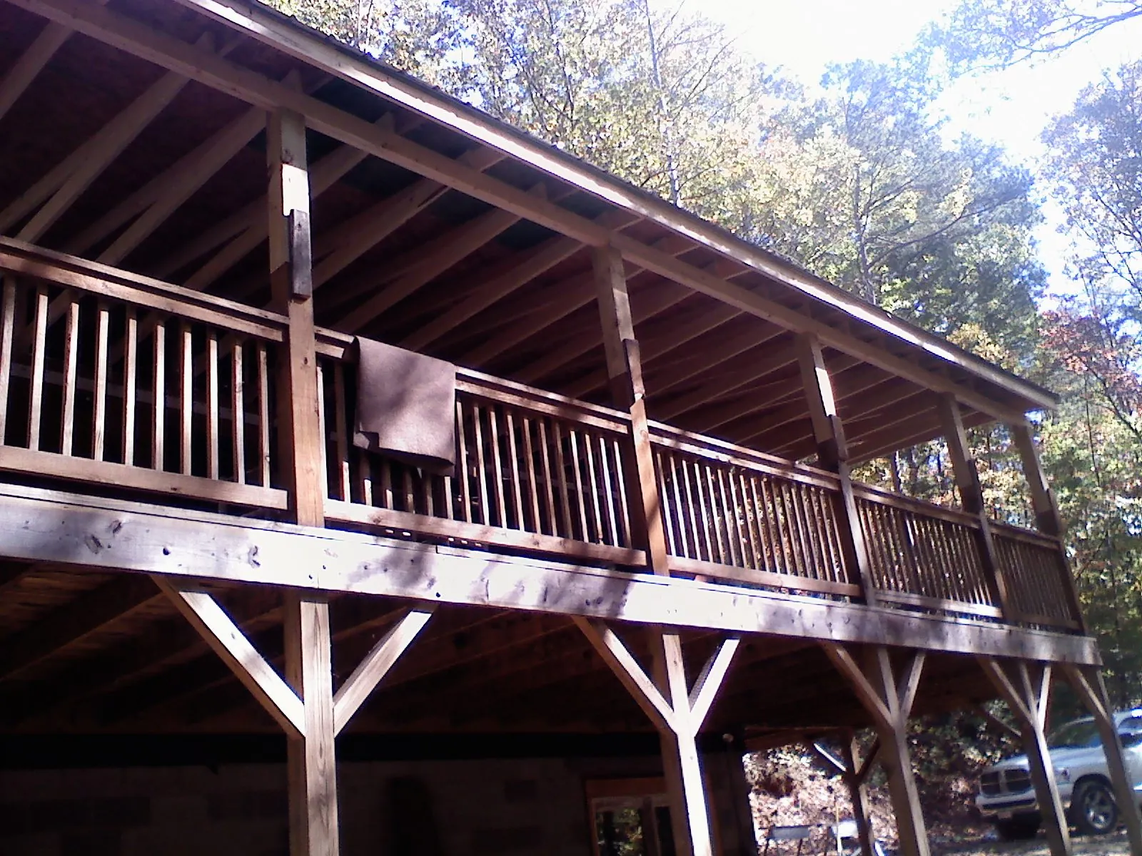 Timber framing under a new elevated porch and deck — Roof Leak Repair in Altmar by Roofing Brothers
